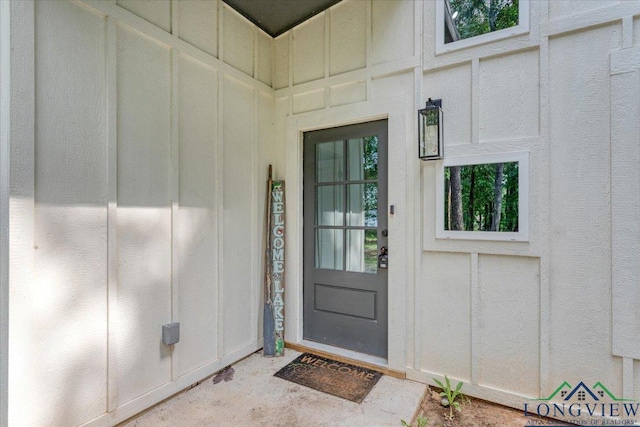 299 Southshore Dr, Lone Star, TX 75668 - doorway to property featuring board and batten siding