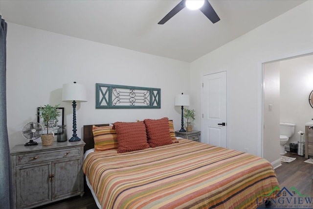 299 Southshore Dr, Lone Star, TX 75668 - bedroom with dark wood-style floors, lofted ceiling, ensuite bathroom, a ceiling fan, and baseboards