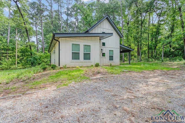 299 Southshore Dr, Lone Star, TX 75668 - view of front of house featuring board and batten siding