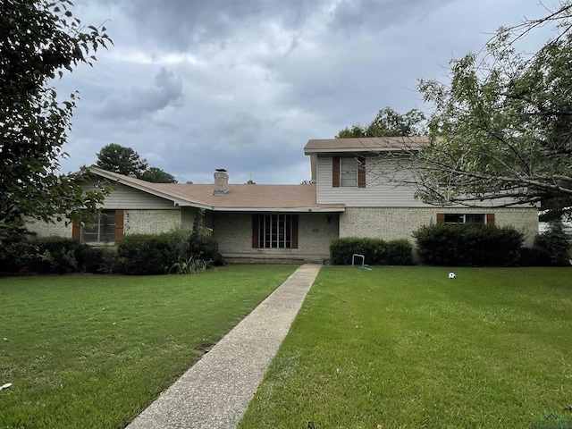 view of front of house with a front yard