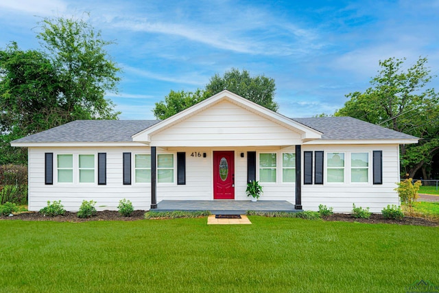 single story home with a front lawn and a porch