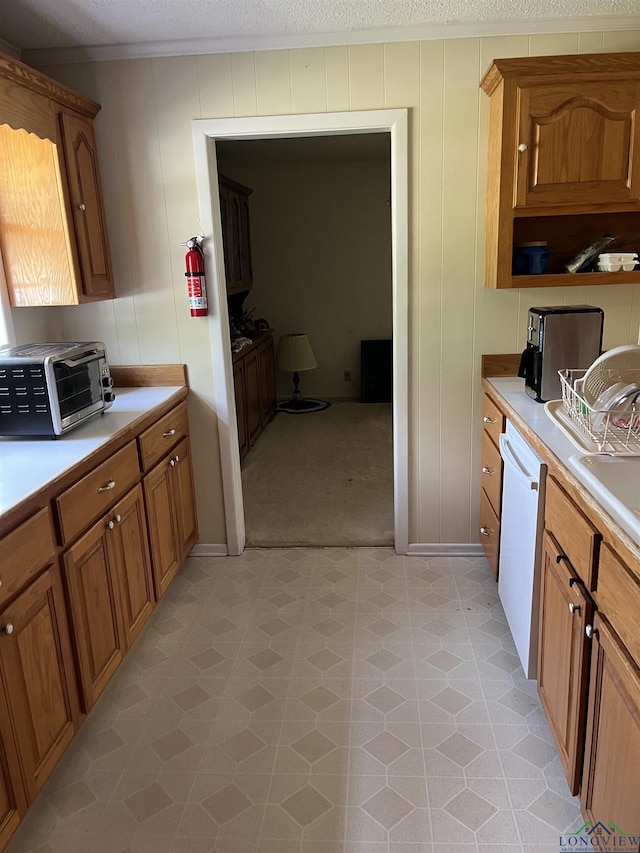 kitchen with dishwasher and sink