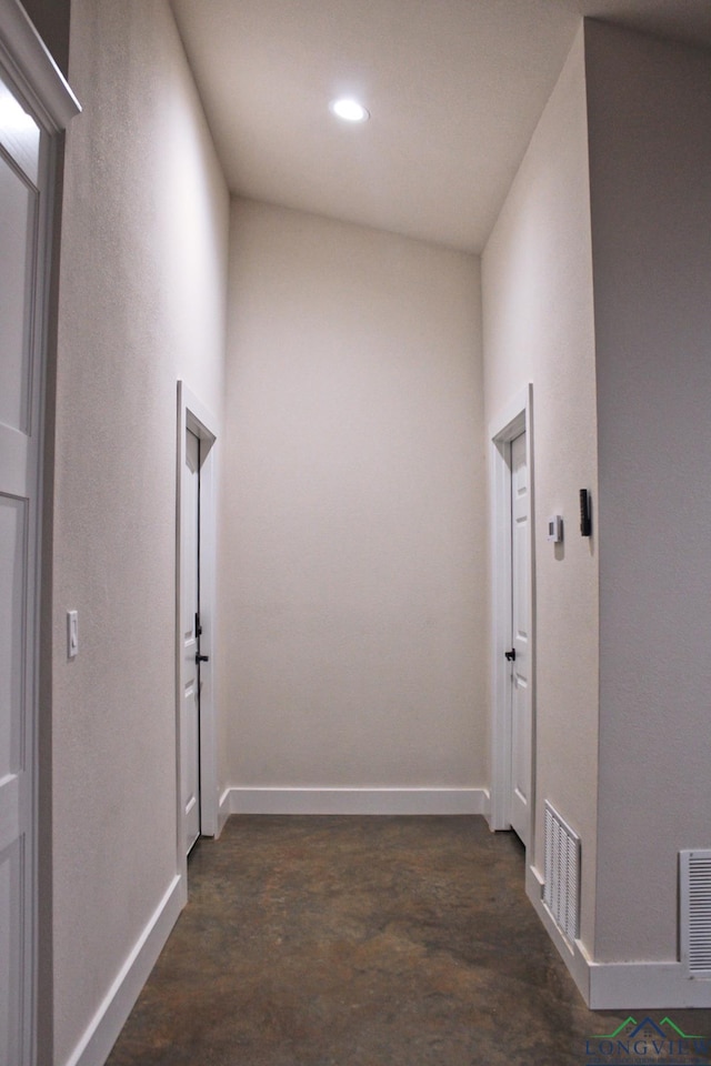 hallway featuring dark hardwood / wood-style flooring