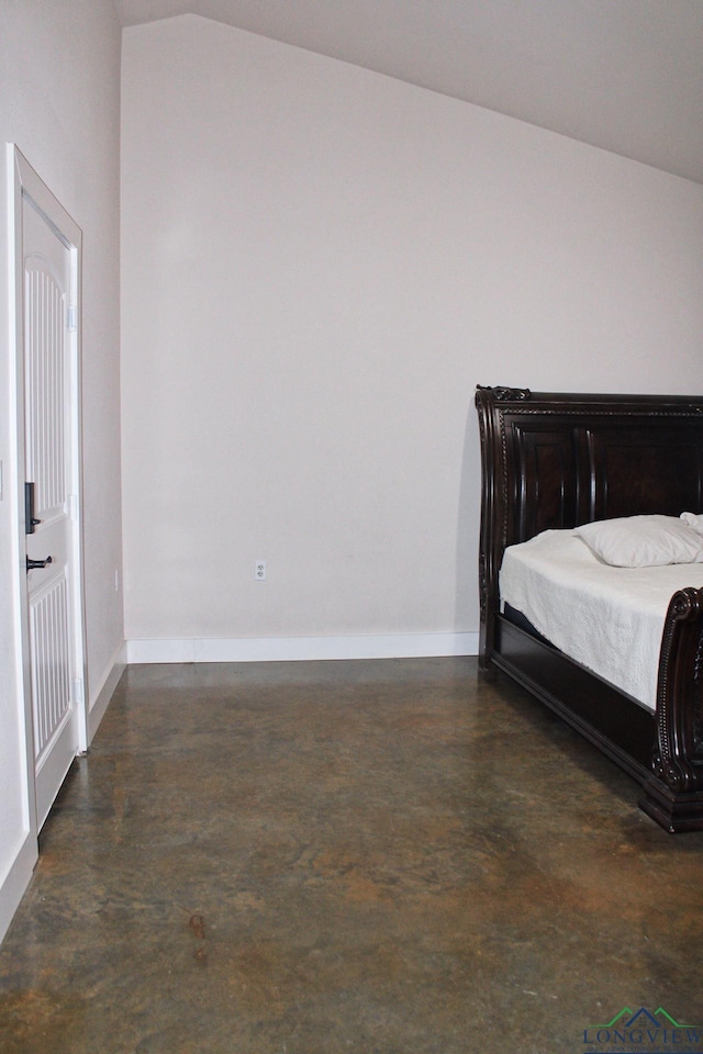 bedroom featuring vaulted ceiling