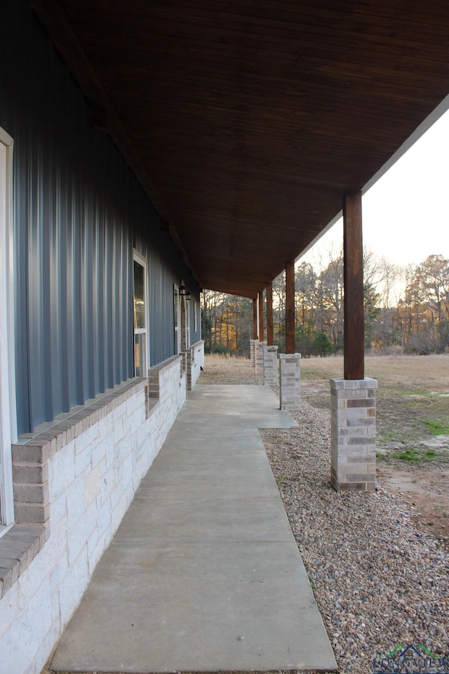 view of patio terrace at dusk