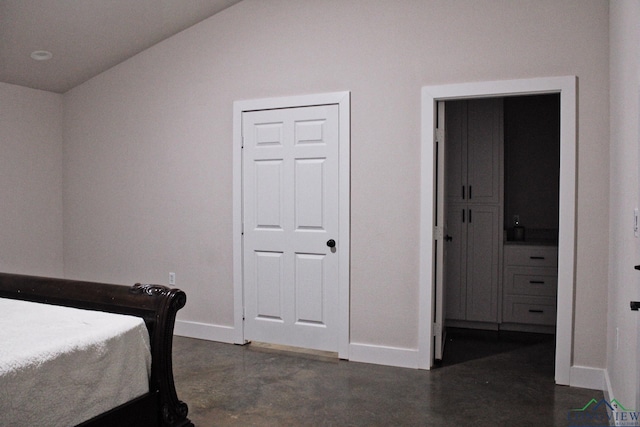 bedroom featuring vaulted ceiling