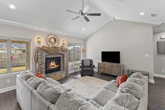 living room with visible vents, a brick fireplace, dark wood finished floors, and vaulted ceiling with beams