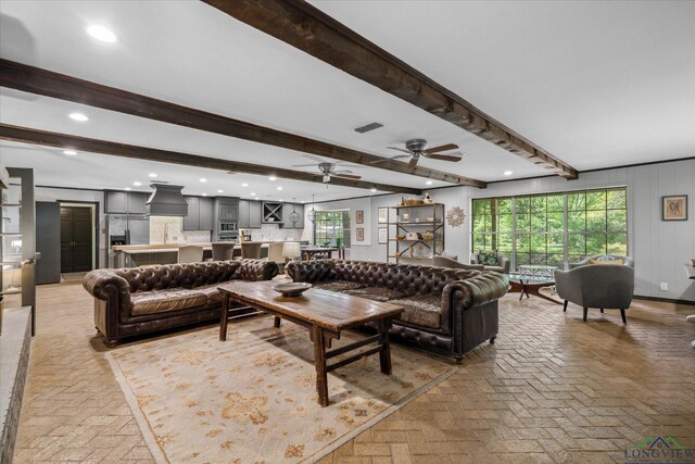 1492 Sleepy Hollow Ln, Canton, TX 75103 - living room featuring brick floor, visible vents, beam ceiling, and ceiling fan