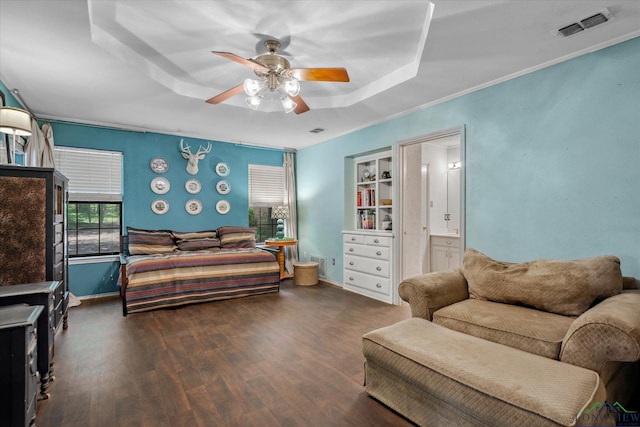 1492 Sleepy Hollow Ln, Canton, TX 75103 - bedroom featuring a tray ceiling, wood finished floors, and visible vents