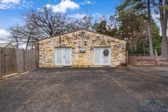 view of outbuilding featuring french doors