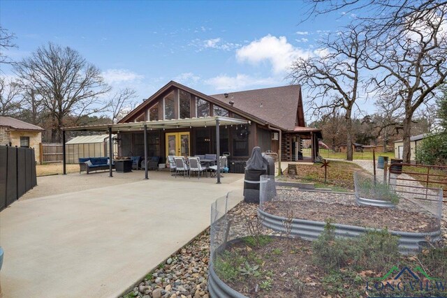 exterior space with an outdoor structure, a covered pool, and a lawn