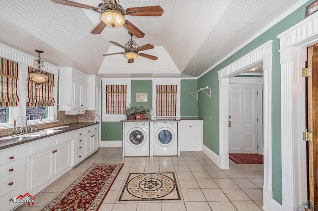 washroom with cabinets, crown molding, sink, separate washer and dryer, and light tile patterned flooring