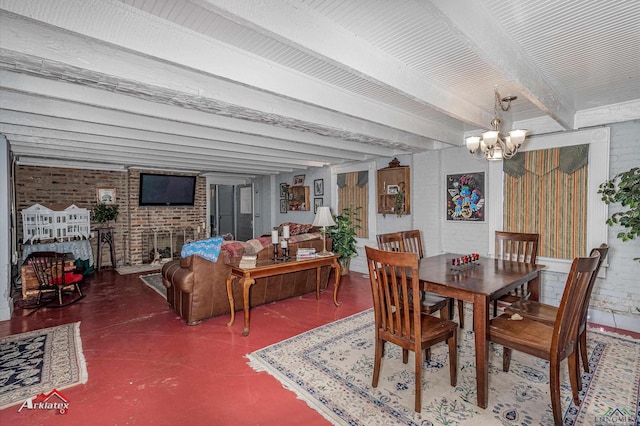 dining space featuring beamed ceiling, brick wall, a notable chandelier, and a brick fireplace