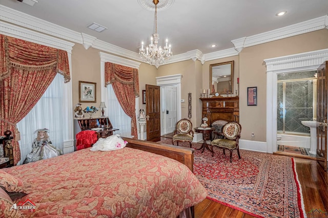 bedroom with hardwood / wood-style floors, crown molding, and multiple windows