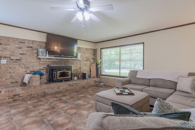 living room featuring a wood stove, ceiling fan, brick wall, and ornamental molding