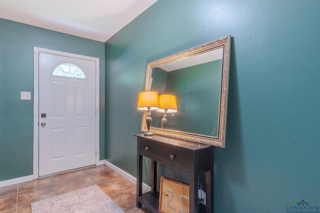 foyer with tile patterned floors