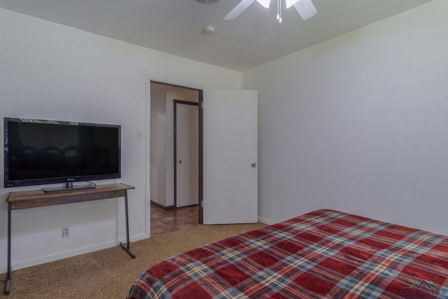 bedroom with light colored carpet and ceiling fan