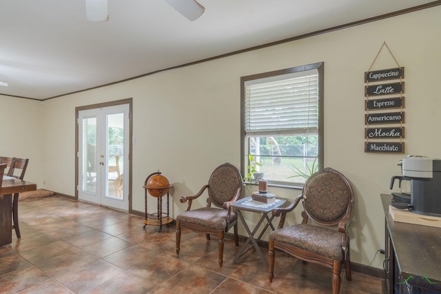 living area with french doors and ornamental molding