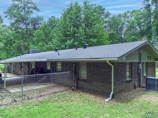 back of property with central air condition unit