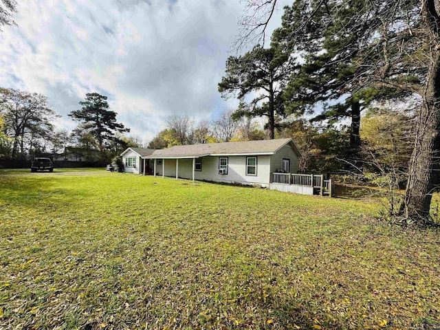 view of yard featuring a deck