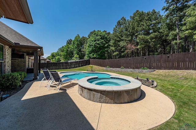 view of pool with a patio area and an in-ground hot tub