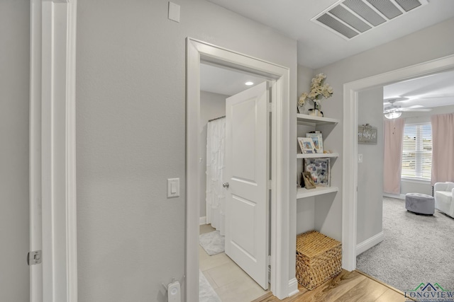 17182 Ironwood Dr, Flint, TX 75762 - hallway featuring light wood-style floors and baseboards