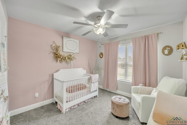 17182 Ironwood Dr, Flint, TX 75762 - carpeted bedroom featuring a crib and a ceiling fan