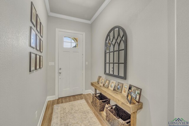 17182 Ironwood Dr, Flint, TX 75762 - entryway featuring wood finished floors and crown molding