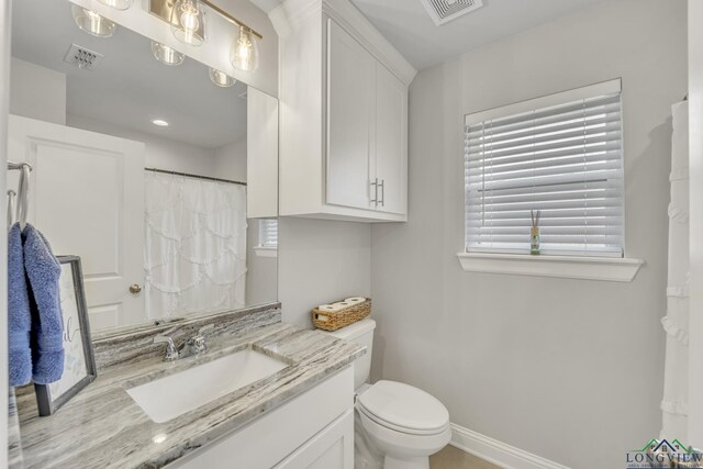 17182 Ironwood Dr, Flint, TX 75762 - bathroom with vanity and a shower with shower curtain