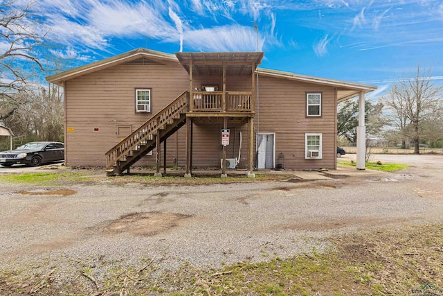 view of front of home with a deck