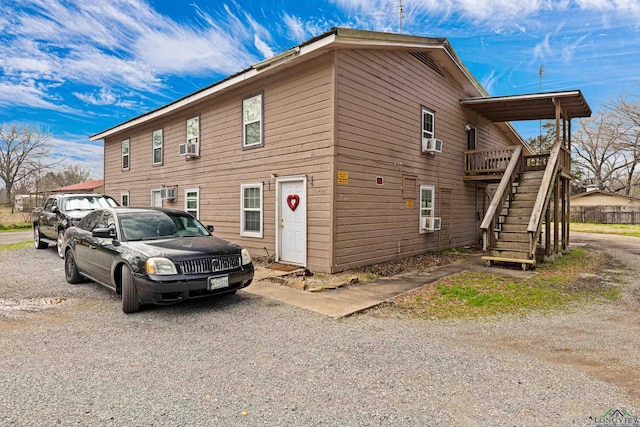 view of side of property featuring cooling unit