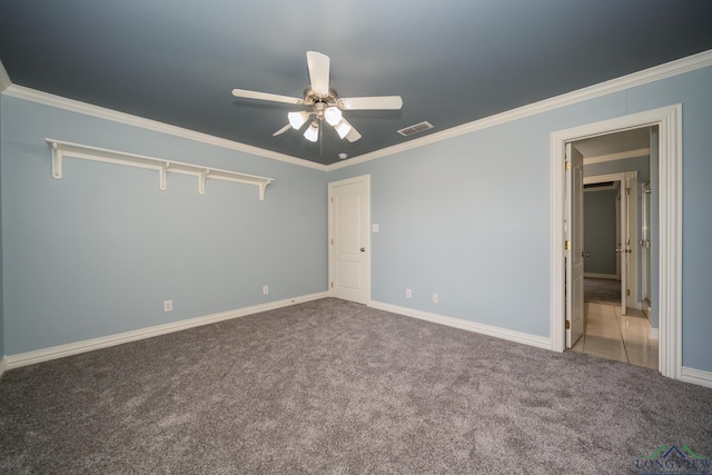 unfurnished bedroom with ceiling fan, light colored carpet, and ornamental molding