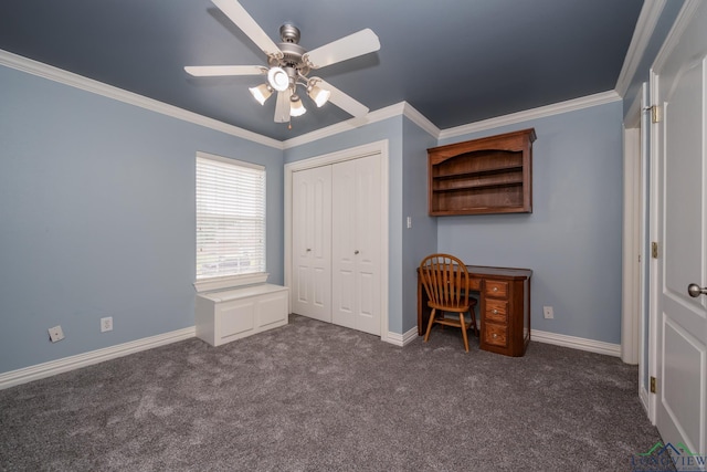 unfurnished office with dark colored carpet, ceiling fan, and ornamental molding