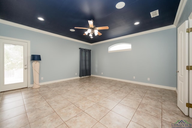 tiled spare room with ceiling fan and crown molding