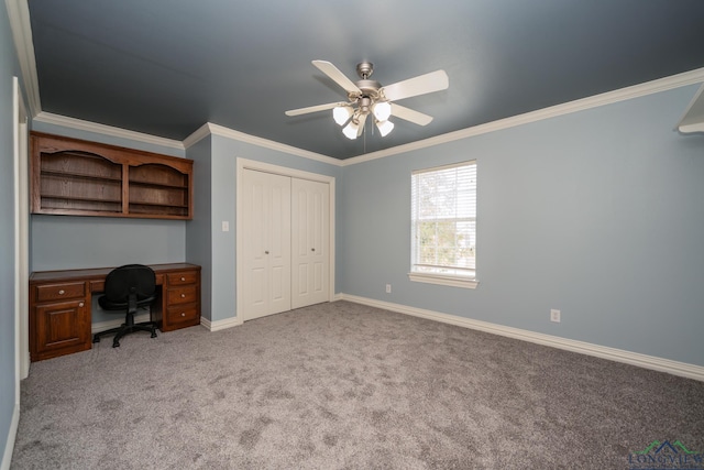 unfurnished office featuring ceiling fan, light colored carpet, and ornamental molding