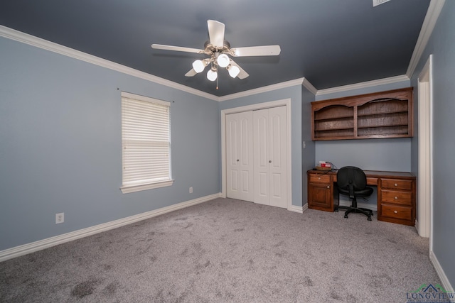 unfurnished office with crown molding, ceiling fan, and light carpet