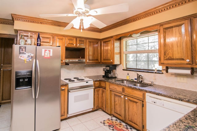 kitchen featuring tasteful backsplash, white appliances, ceiling fan, sink, and light tile patterned floors