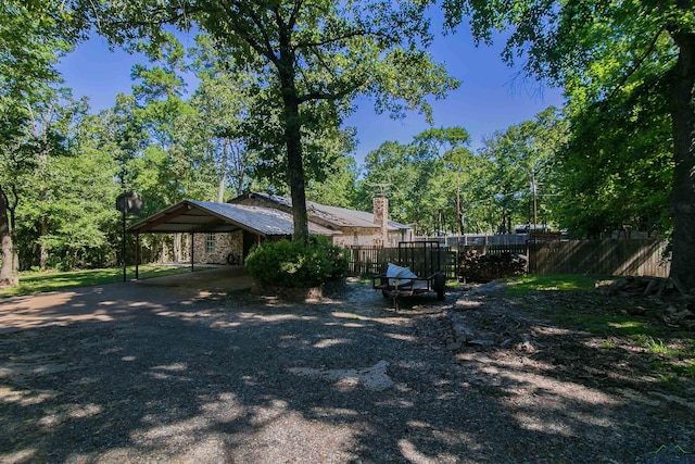 view of yard with a carport