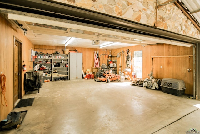 garage with wood walls