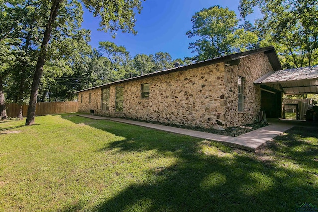 view of property exterior featuring a yard