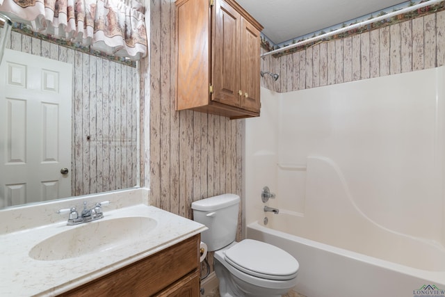 full bathroom featuring vanity, toilet, and shower / bath combination