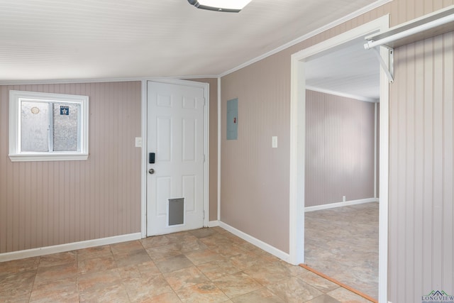 foyer entrance featuring crown molding and electric panel