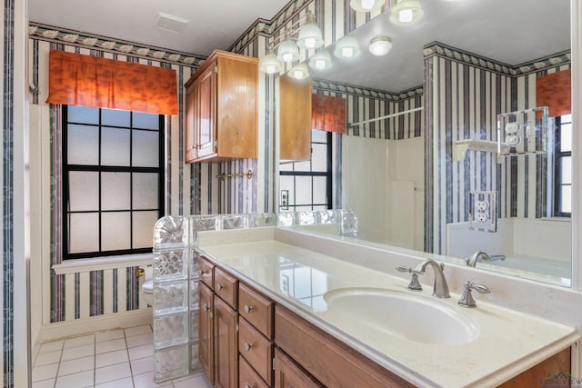 bathroom with vanity and tile patterned floors