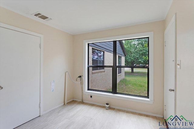 104 Mackinnon St, Mount Pleasant, TX 75455 - empty room featuring baseboards