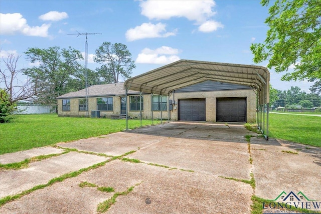 104 Mackinnon St, Mount Pleasant, TX 75455 - view of front of home with a front yard, a garage, driveway, and brick siding