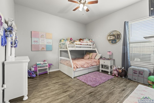 bedroom featuring hardwood / wood-style flooring and ceiling fan