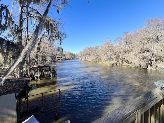 view of dock with a water view