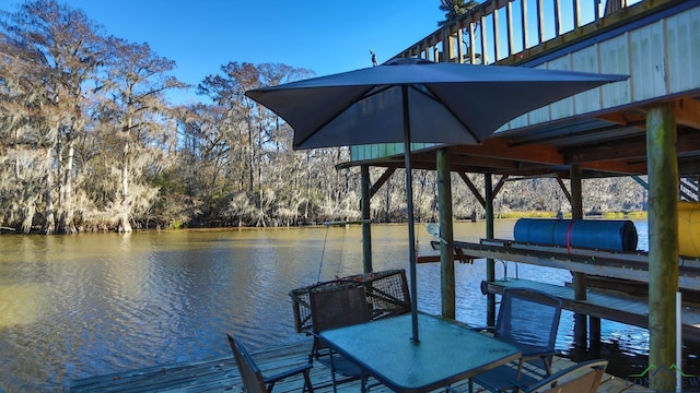 view of dock with a water view