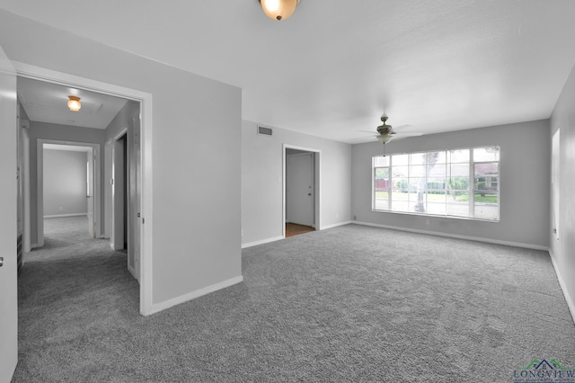 202 W Rocky Creek Rd, Houston, TX 77076 - empty room featuring carpet, a ceiling fan, baseboards, and attic access
