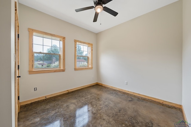 9089 Raspberry Ave, Frankston, TX 75763 - spare room with concrete flooring, baseboards, and a ceiling fan